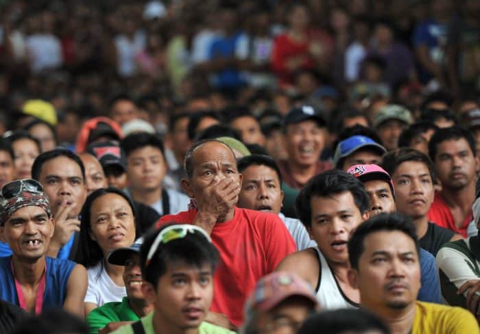 A fan reacts after watching boxer Manny Pacquiao lose to Floyd Mayweather.