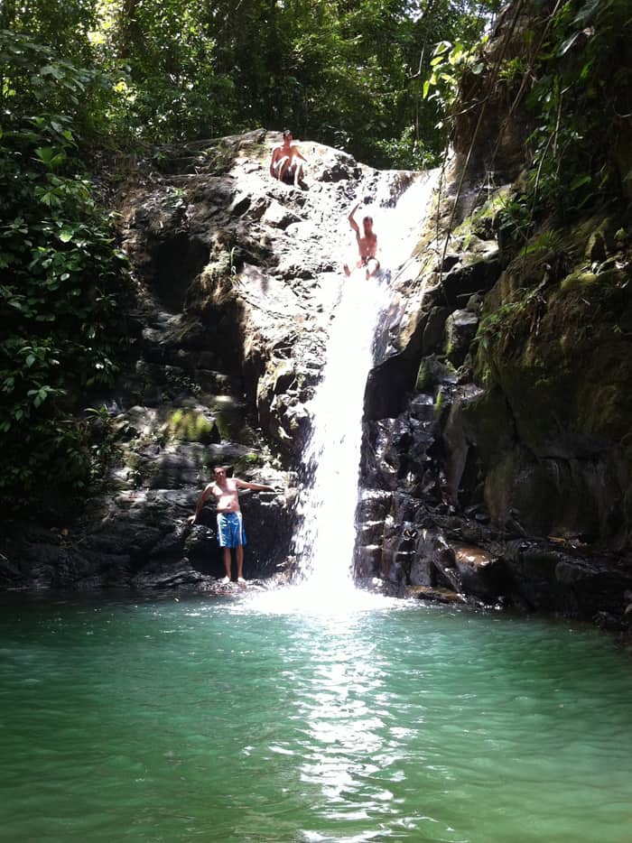 Weeeee! Sliding down a waterfall.