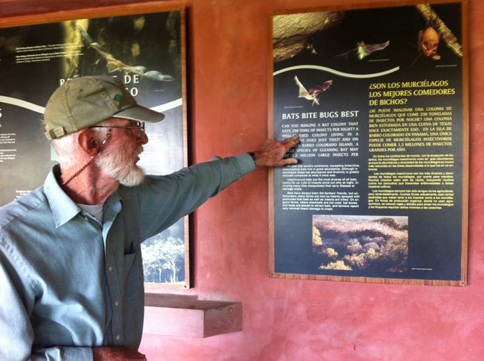 Richard LaVal points to an exhibit that mentions a bat colony that eats 250 tons of insects per night.