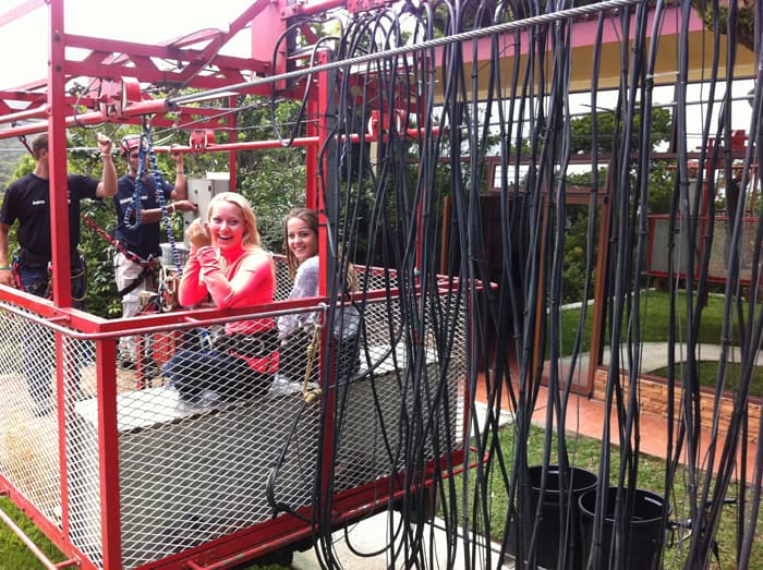 A couple of happy bungee jumpers return to solid ground.