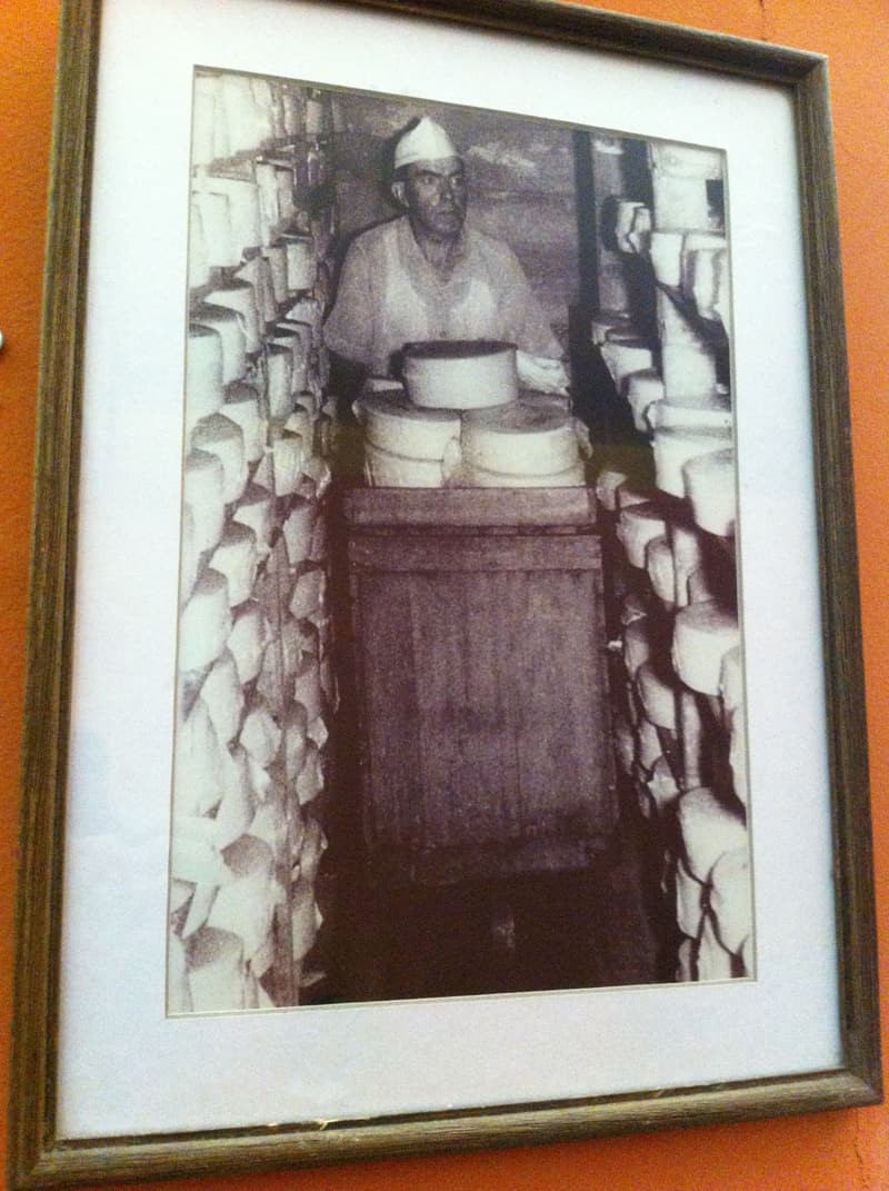 An early worker in the Monteverde Cheese Factory storage room.