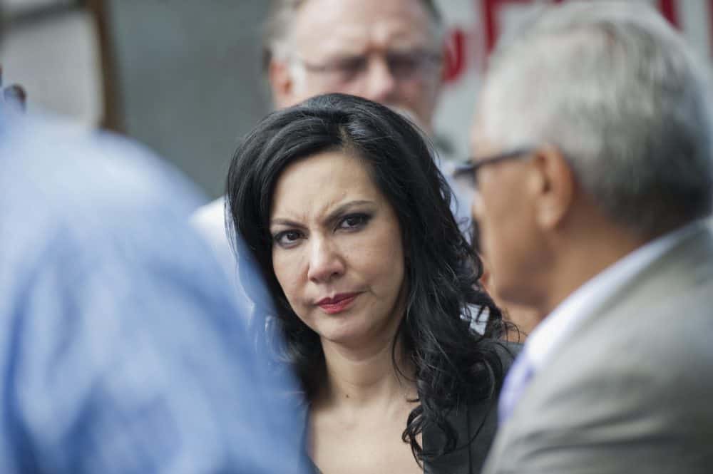 Guatemalan presidential candidate for the Vision with Values (VIVA) party, Zury Ríos Montt, arrives at the scene where one of her father's lawyers, Francisco Palomo, was shot dead in Guatemala City, on June 3, 2015.