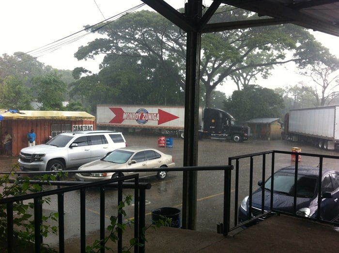 As we wait for Paul to register the car, the skies open and rain pours in the parking lot.