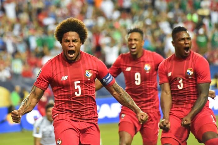 Panama's Roma Torres (L) celebrates scoring.