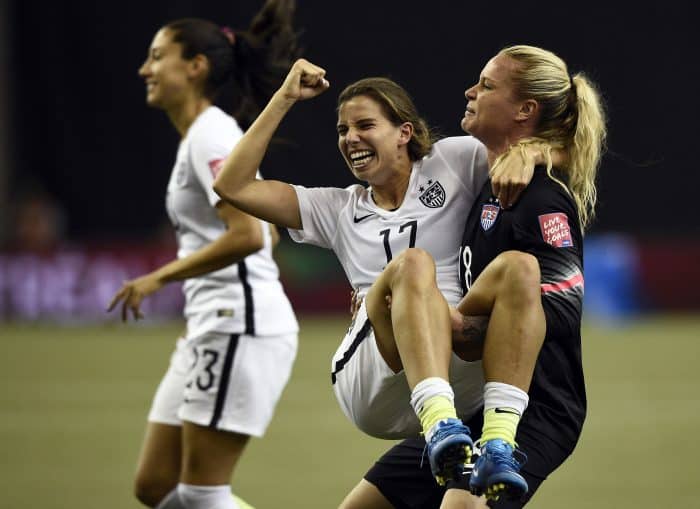U.S. midfielder Tobin Heath, left, and goalkeeper Ashlyn Harris.