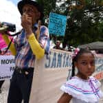 Water protests greet Costa Rica's Solís in Nicoya during annual festival