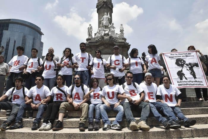 Photojournalists protest with T-shirts that say "Justice For Rubén" in Mexico City, on Aug. 16, 2015.