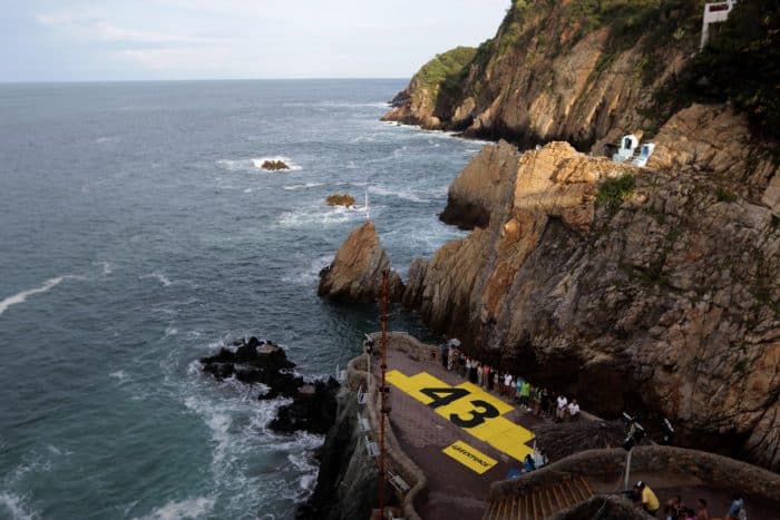 Greenpeace protests against the disappearance of 43 students from Ayotzinapa, at La Quebrada in Acapulco, Mexico, on Sept. 6, 2015.