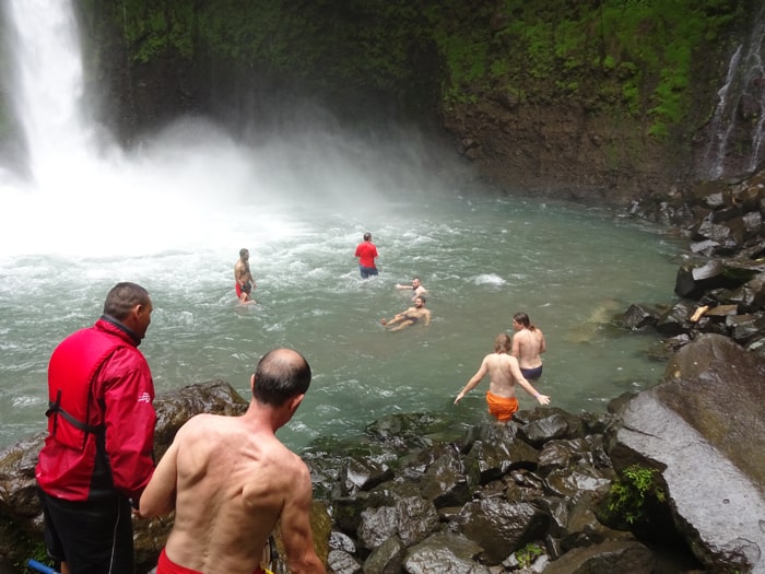 Lifeguard John Ramirez López is at left in red.