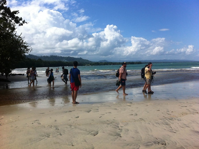 Some wading required: Crossing a shallow river at Cahuita.