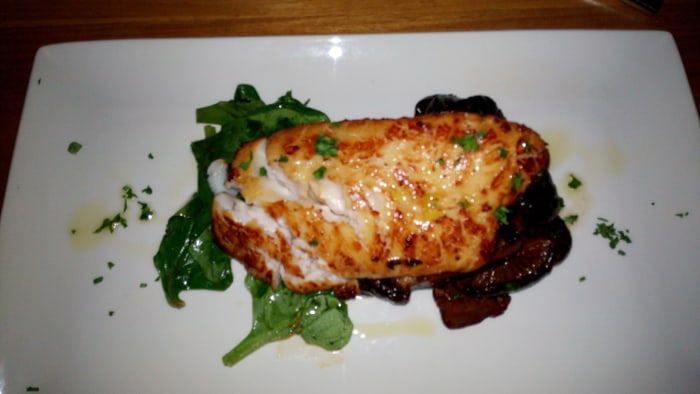 Roasted king sea bass with miso-tangerine glaze and roasted shitake mushrooms.