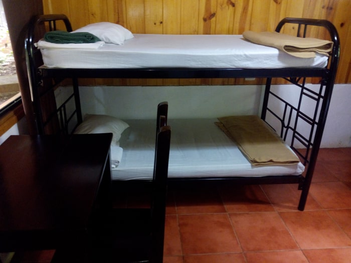 One of two bunk beds, but best of all — a desk!