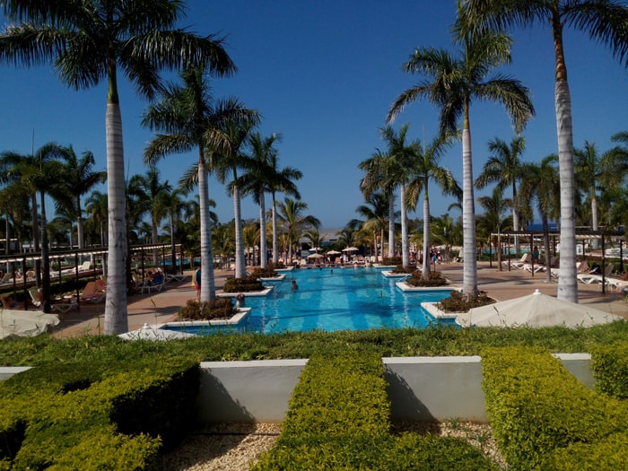 Pools and palms at the RIU Palace.