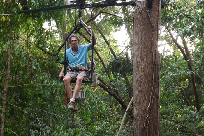 Don Perry sitting on what he considers "the future of canopy exploration."
