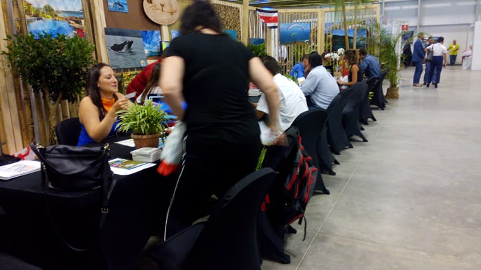 Laura Robleto of Aventuras Tropicales welcomes a visitor to her table.