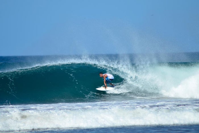 Mario Avendaño takes a wave.