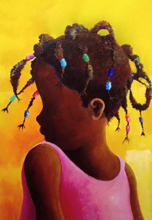 Adrián Gómez is set to paint his colorful Caribbean images on a wall at Best Western Tamarindo Vista Villas.