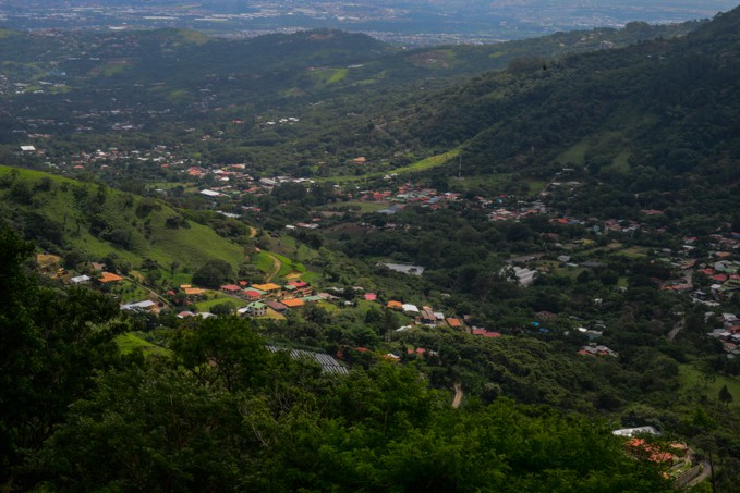 Buildings sprawl along the bottom of the Valle del Sol.