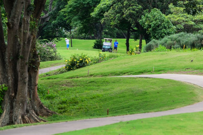 A golfer takes a swing at the Valle del Sol Golf Course.