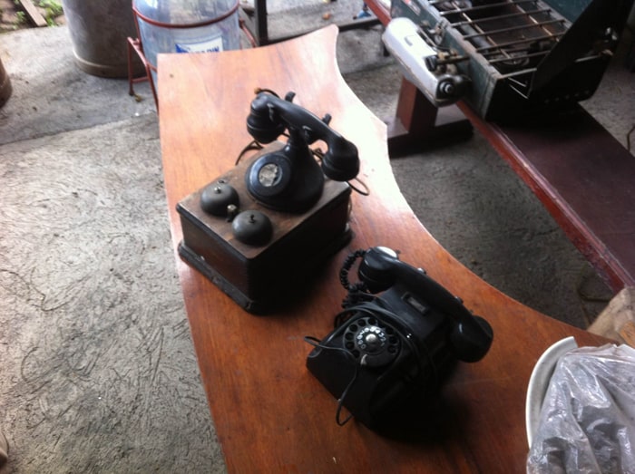 The old telephone, left, is said to be the oldest antique at Antiguedades Santa Ana.