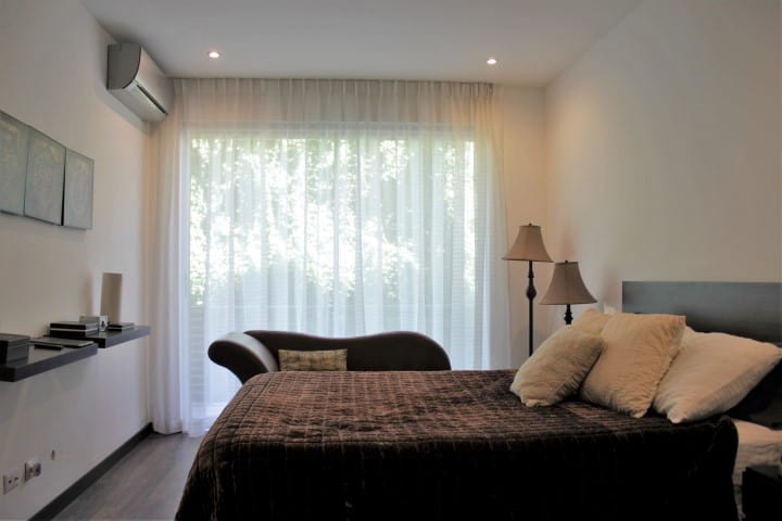 Bedroom at condo for rent at Nova Lofts.