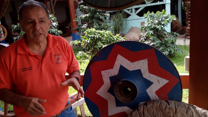 An old wheel made from one big piece of wood.