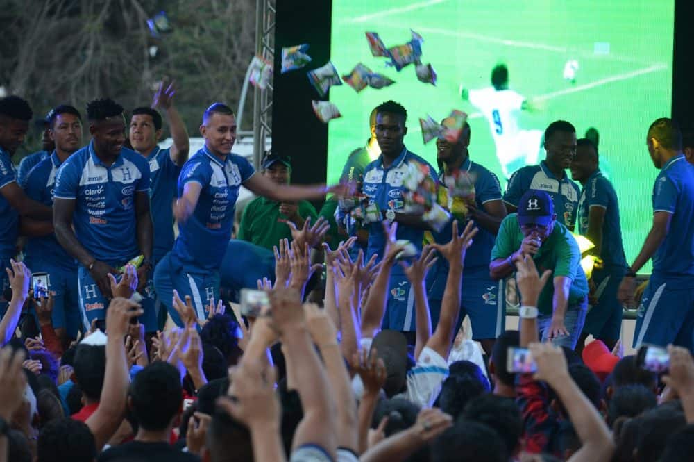 Honduran National Team members greet fans.