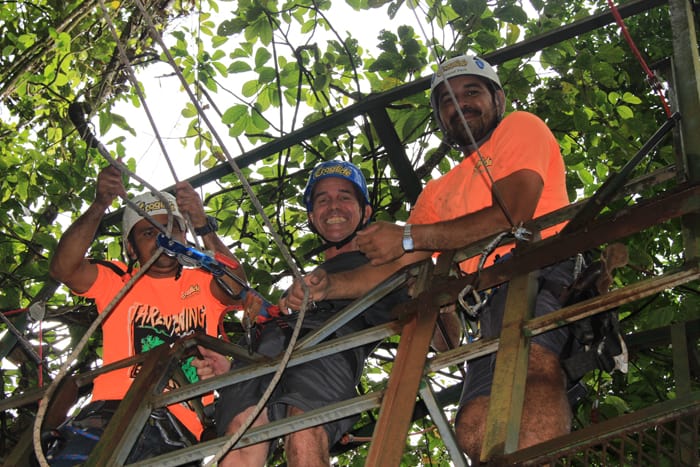 The author straps in for the Tarzan swing.
