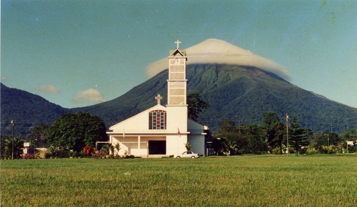 Arenal seems to be wearing a white hat in 1990, when La Fortuna's central park was still a soccer field.