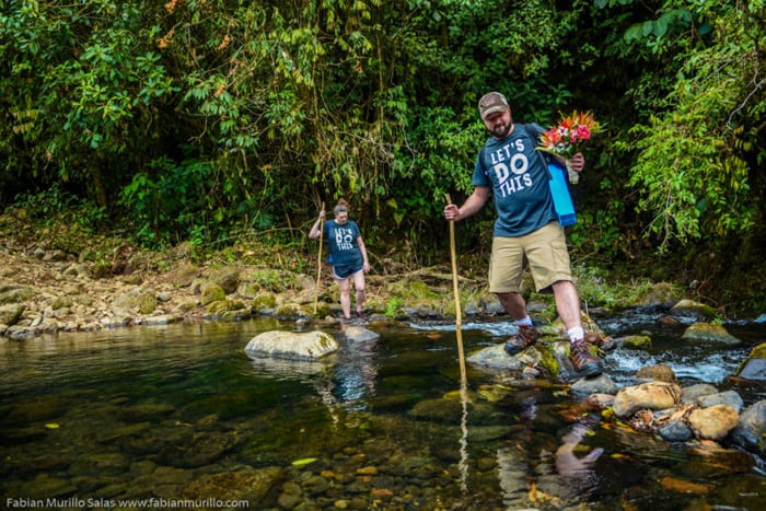 The T-shirt says it all at this wedding with a river crossing.