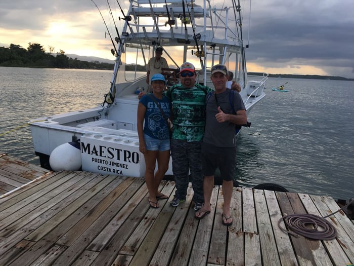 Guiselle, Oscar and Karl at the Crocodile Bay pier at the end of the day.