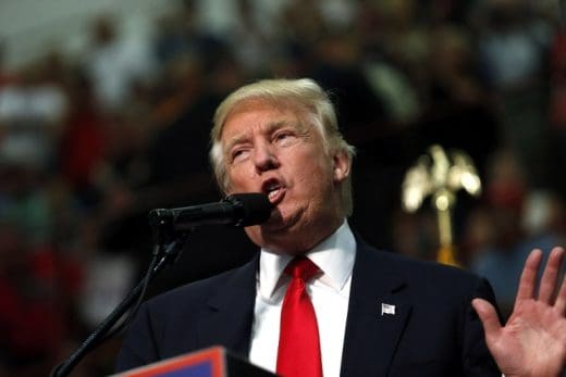 Trump warns Honduran president to stop migrants en route to U.S.